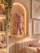 Urso decorativo de cerâmica rosa